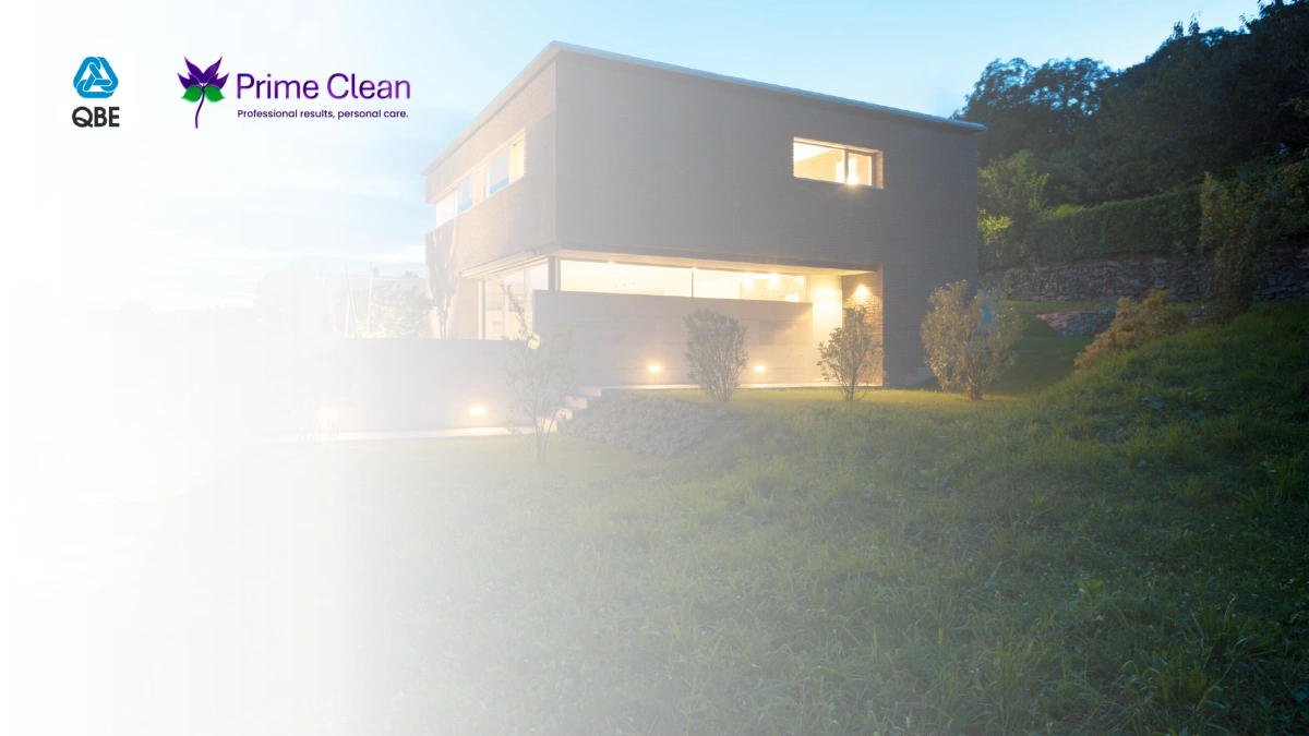 A luxury home overlayed with the QBE and Prime Clean logos.