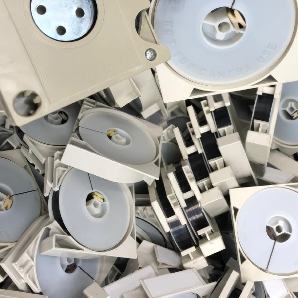 Pile of microfilm reels, ready to be shredded.