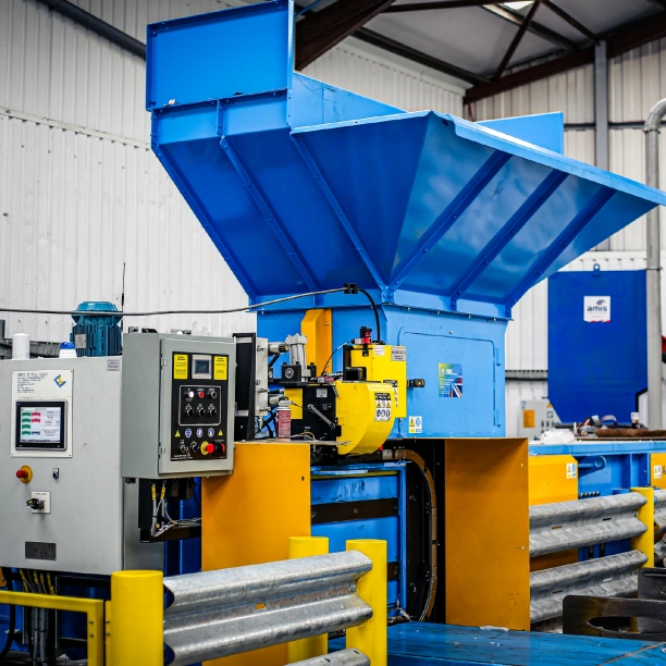Industrial plastic baler.