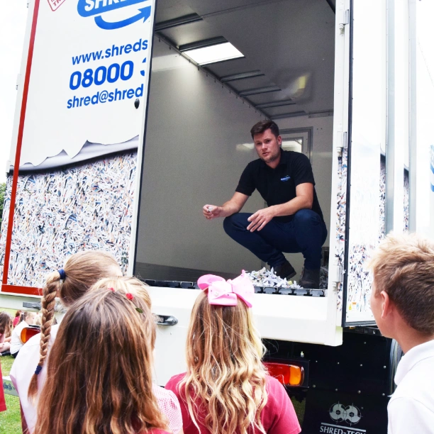 Operations Director, Oliver Grice, performing a shredding demonstration at a local primary school.