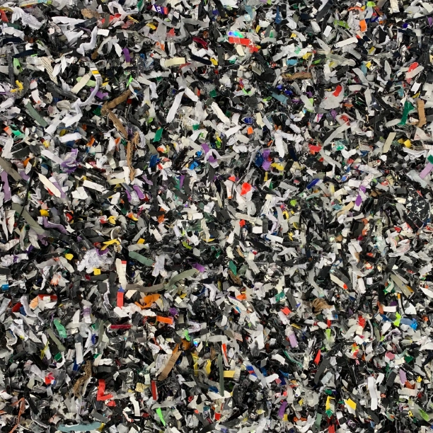 A large pile of shredded floppy disks.