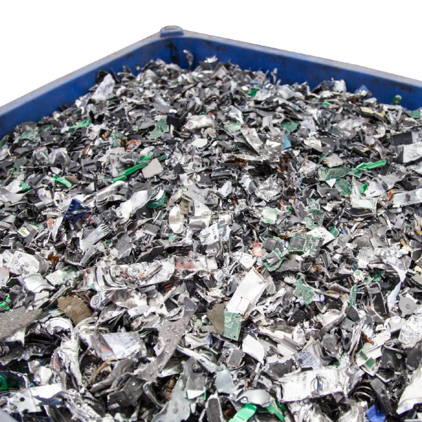 Shredded hard drives inside a large blue plastic container