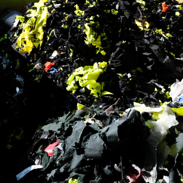 Pile of shredded uniforms.