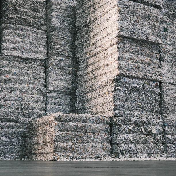 Stacks of baled, shredded paperwork.