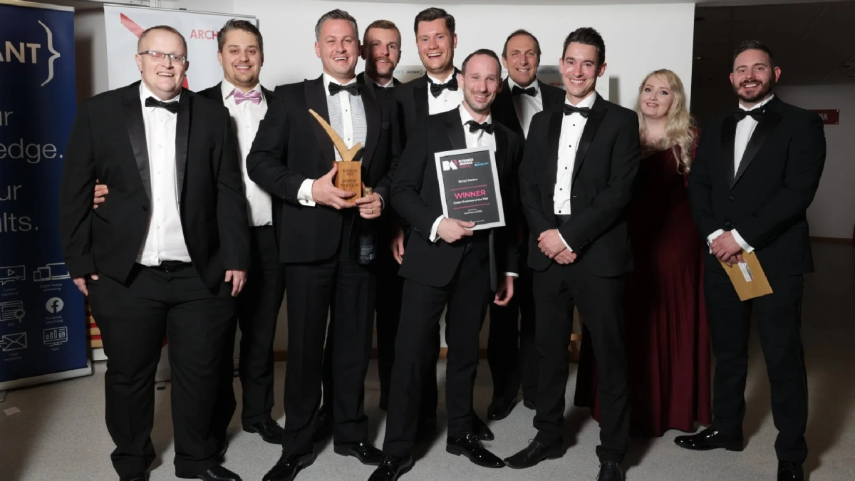 Shred Station's team receiving the Green Business of the Year award.