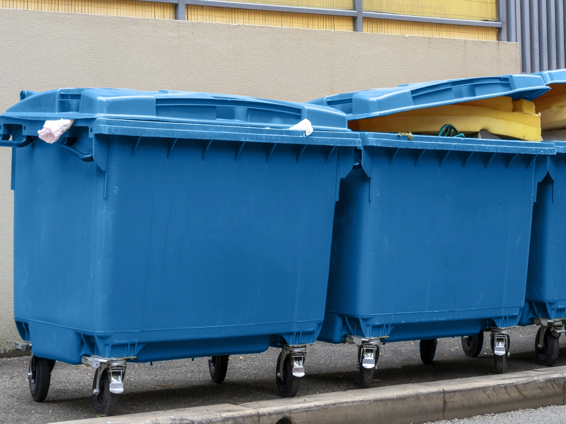 Blue general waste bins.