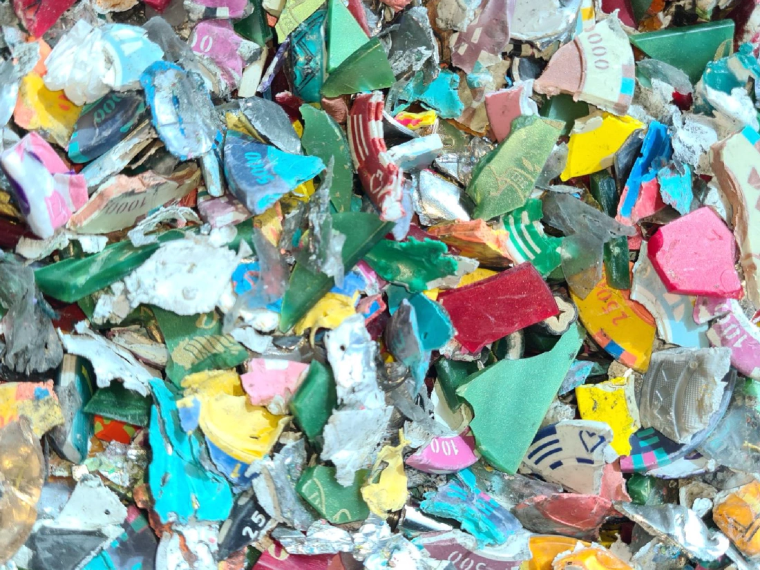 Pile of shredded poker chips.