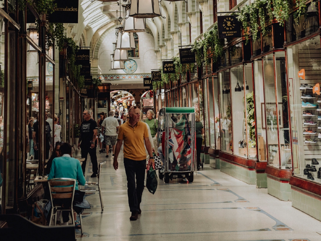 A row of small independent shops inside Norwich's Royal Arcade.