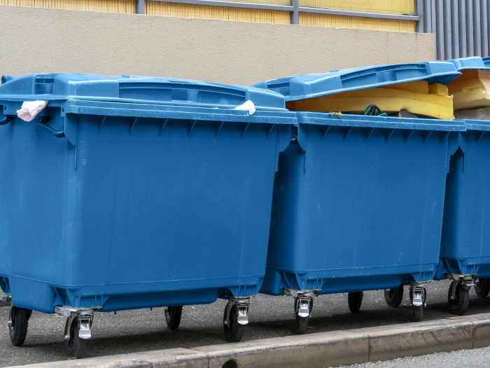 Blue general waste bins.