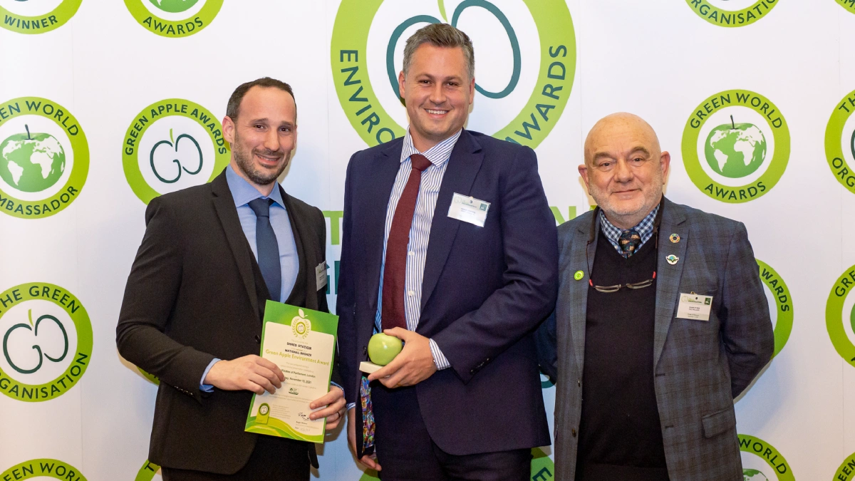 Kristian Carter and Simon Franklin receiving the company's first Green Apple award.