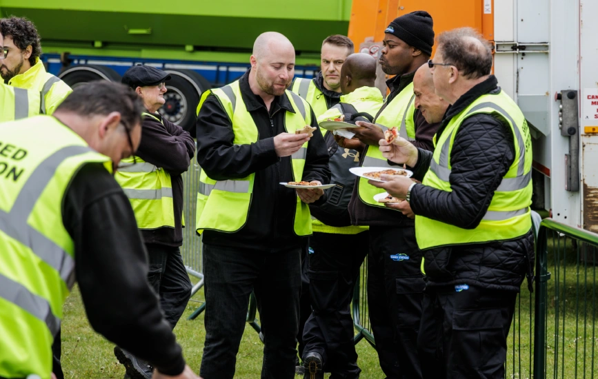 Shred Station staff celebrating the company's 15-year anniversary.