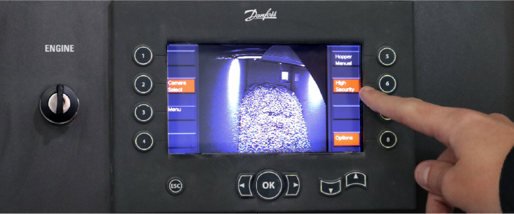 Shred Station's truck security camera system showing one of the camera views from inside an on-site shredding truck. On the screen, you can seen a pile of shredded paperwork.