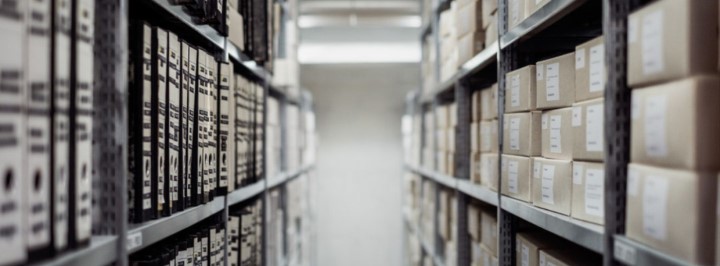 Image of shelving full of archive boxes