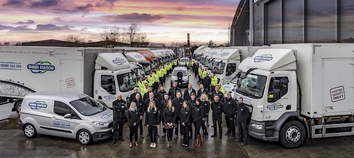 Shred Station staff and shredding trucks