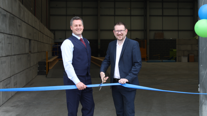 Image of Shred Station managing director, Simon Franklin, cutting the ribbon on the Manchester shredding depot with local MP, Andrew Gwynne.