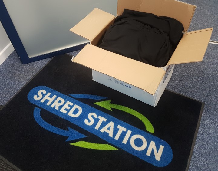 Box of hoodies that Shred Station donated to Salvation Army Norwich Citadel for their soup kitchen in Norwich