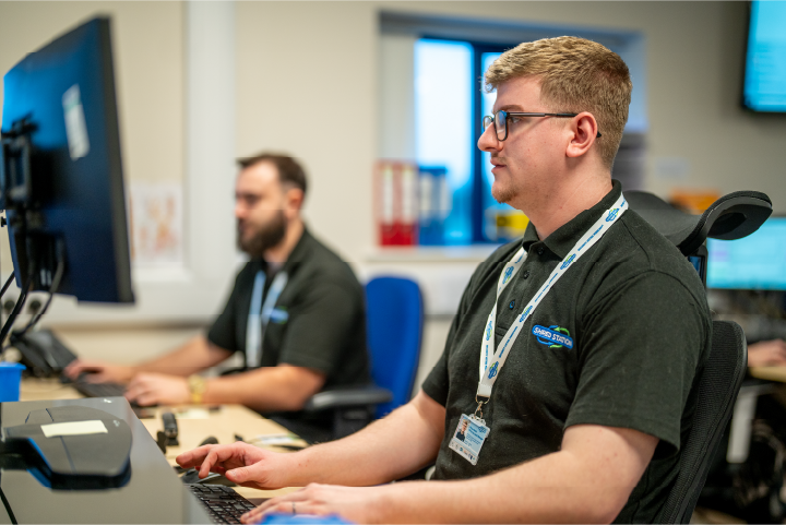 Office staff surrounded by refurbished equipment and furnishings