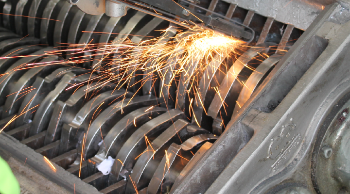 Image showing an industrial shredder being sharpened